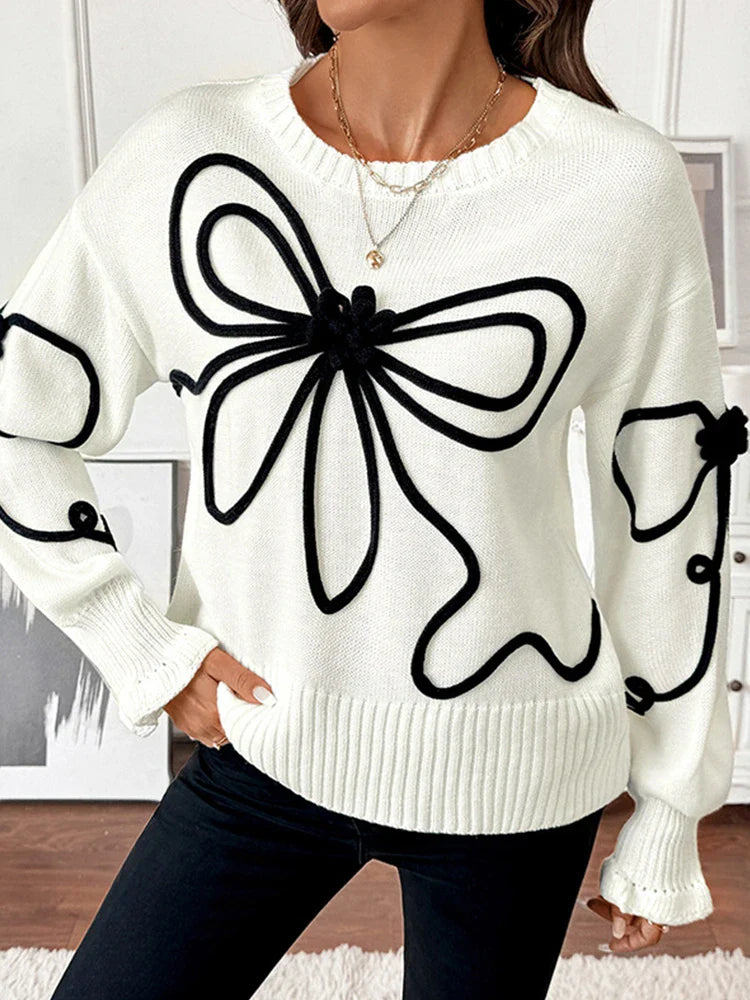 Pull en maille à nœud femme