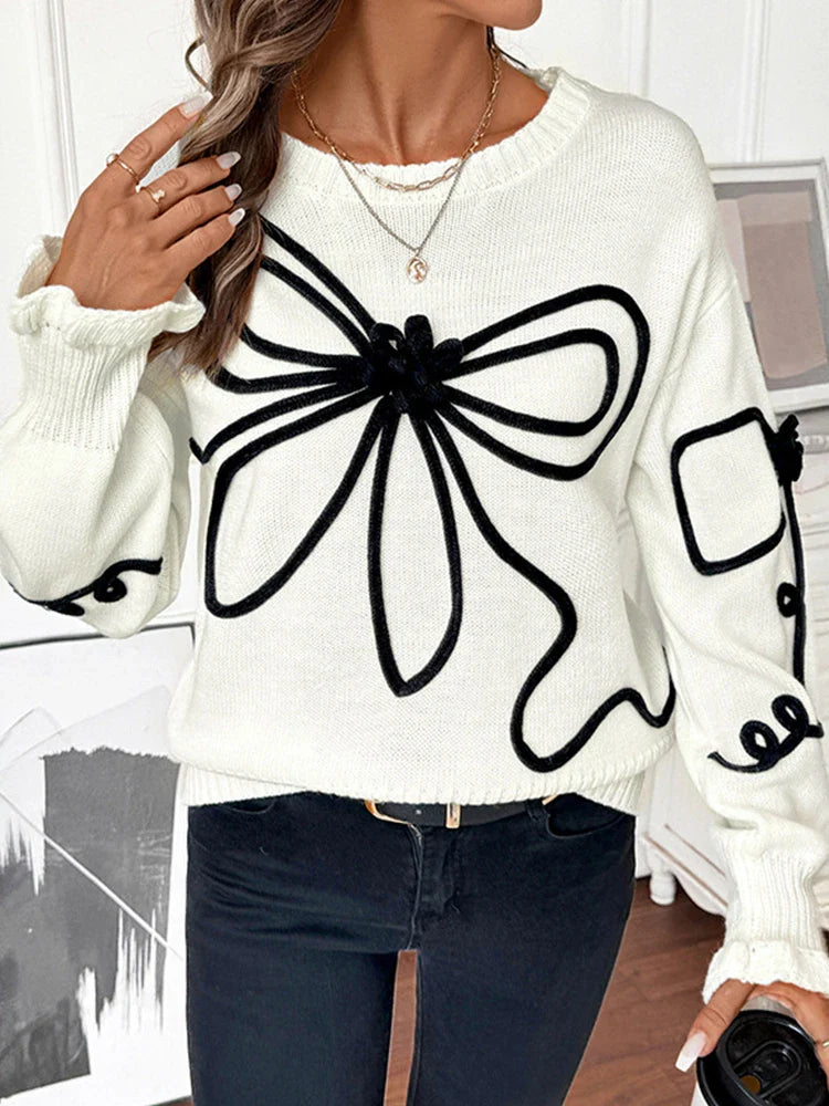 Pull en maille à nœud femme