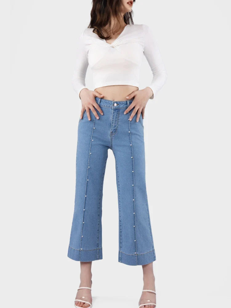Jean court taille haute jambe droite femme