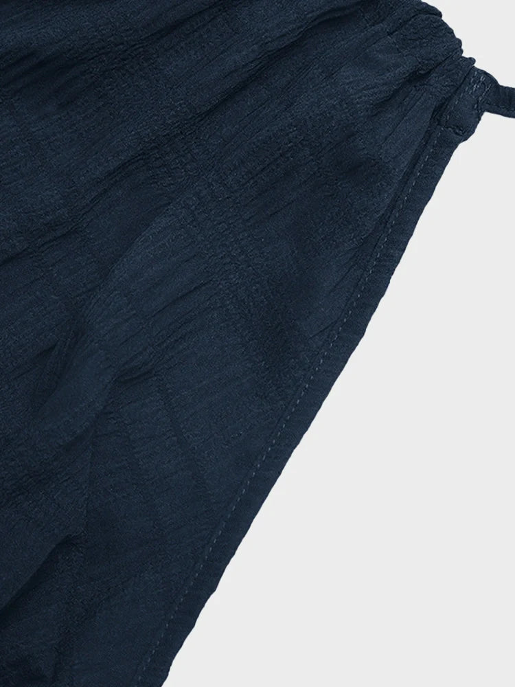 Robe longue dos nu à col licou en tissu texturé