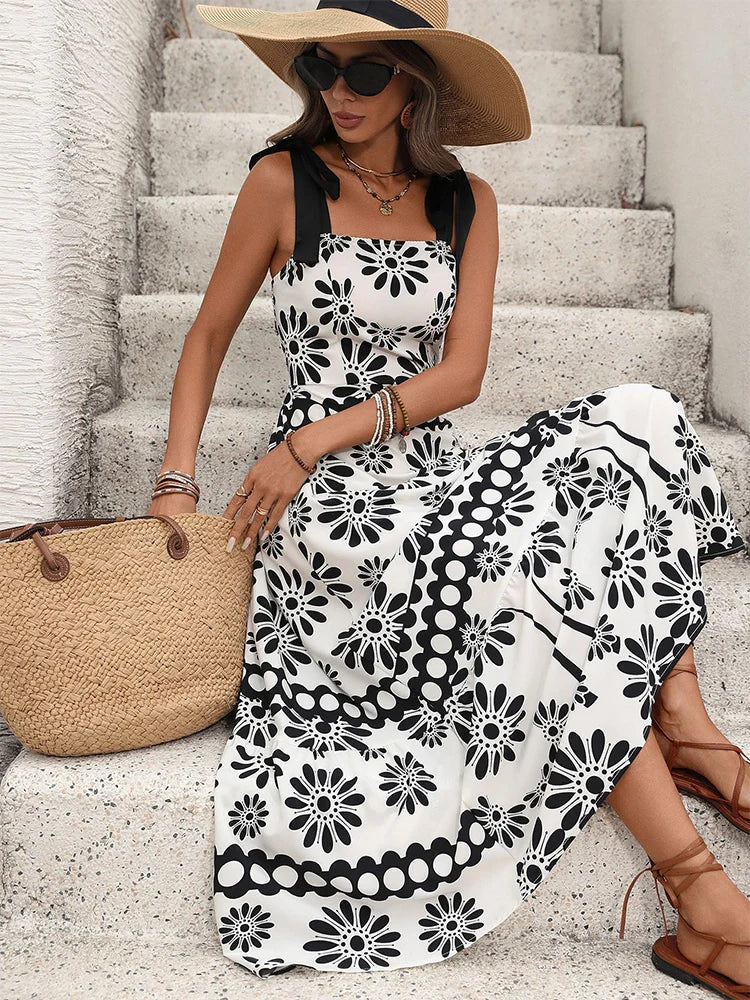 Robe longue imprimée dos nu à col licou