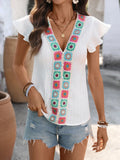 Blouse bohème brodée à col V