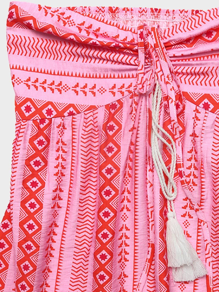 Robe longue dos nu à motif géométrique et jupe à volants