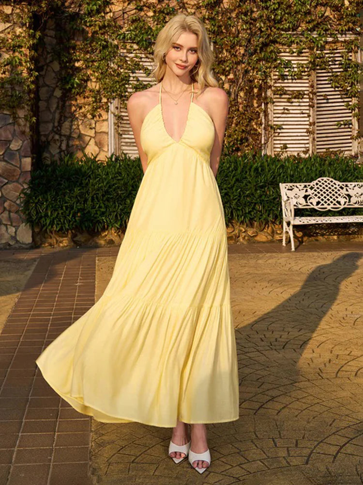 Robe longue à volants étagés et col dos-nu