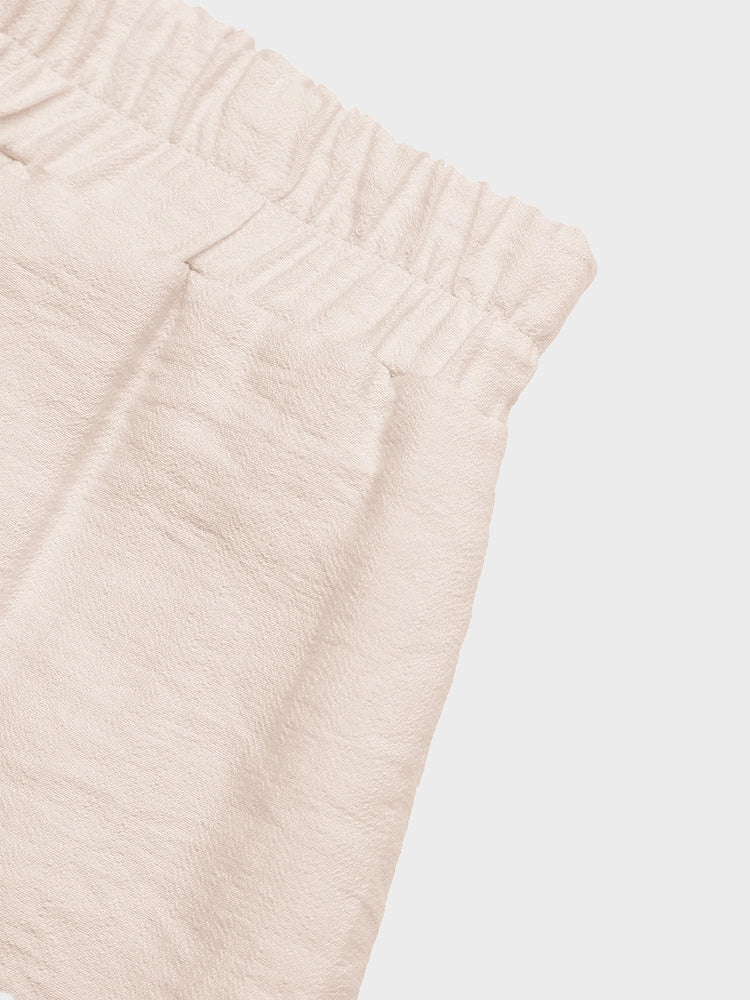 Short femme taille élastique à ourlet à pompons