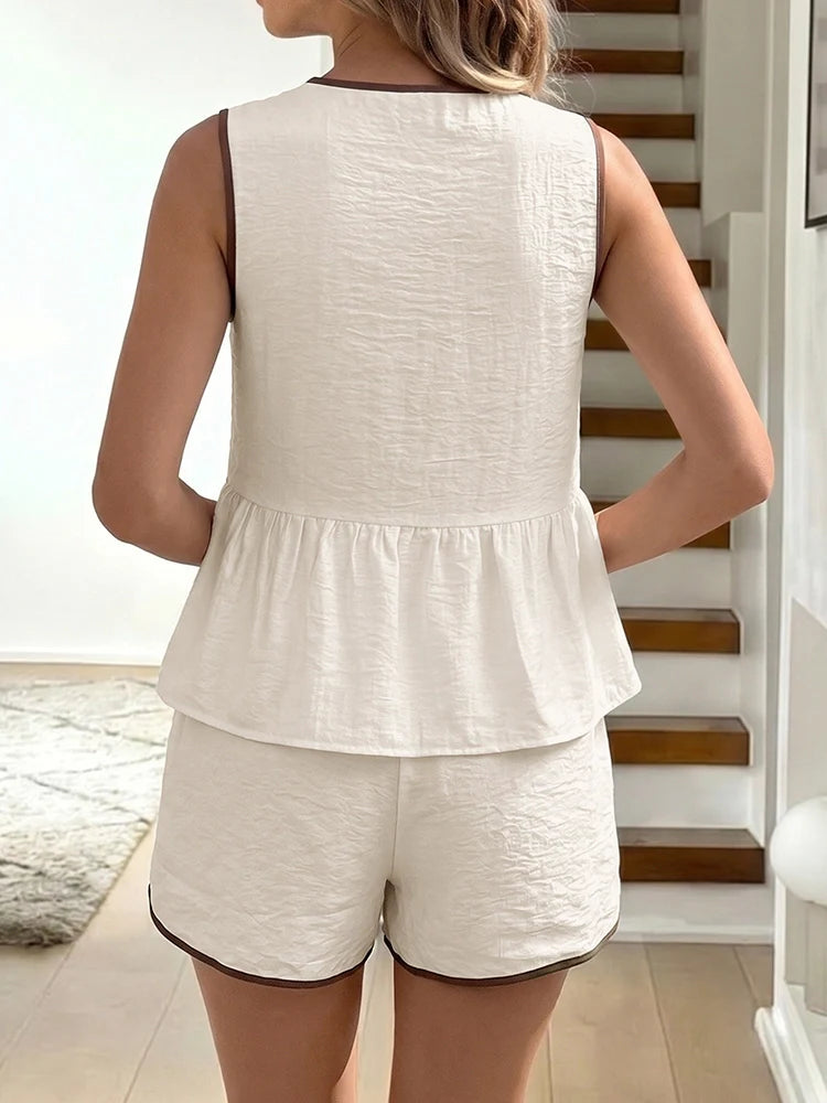 Ensemble top péplum sans manches à nœud et short