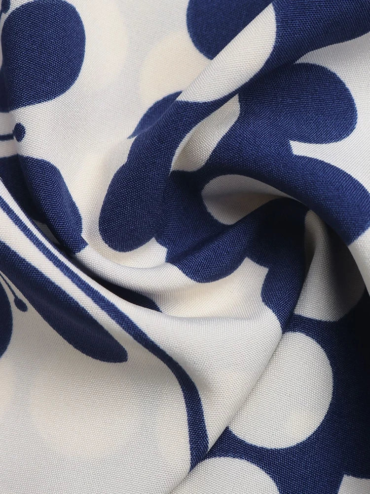 Robe portefeuille col V plongeant à découpe